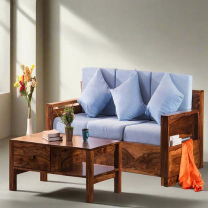 Honey wood single seater sofa chair with blue cushions and three back pillows