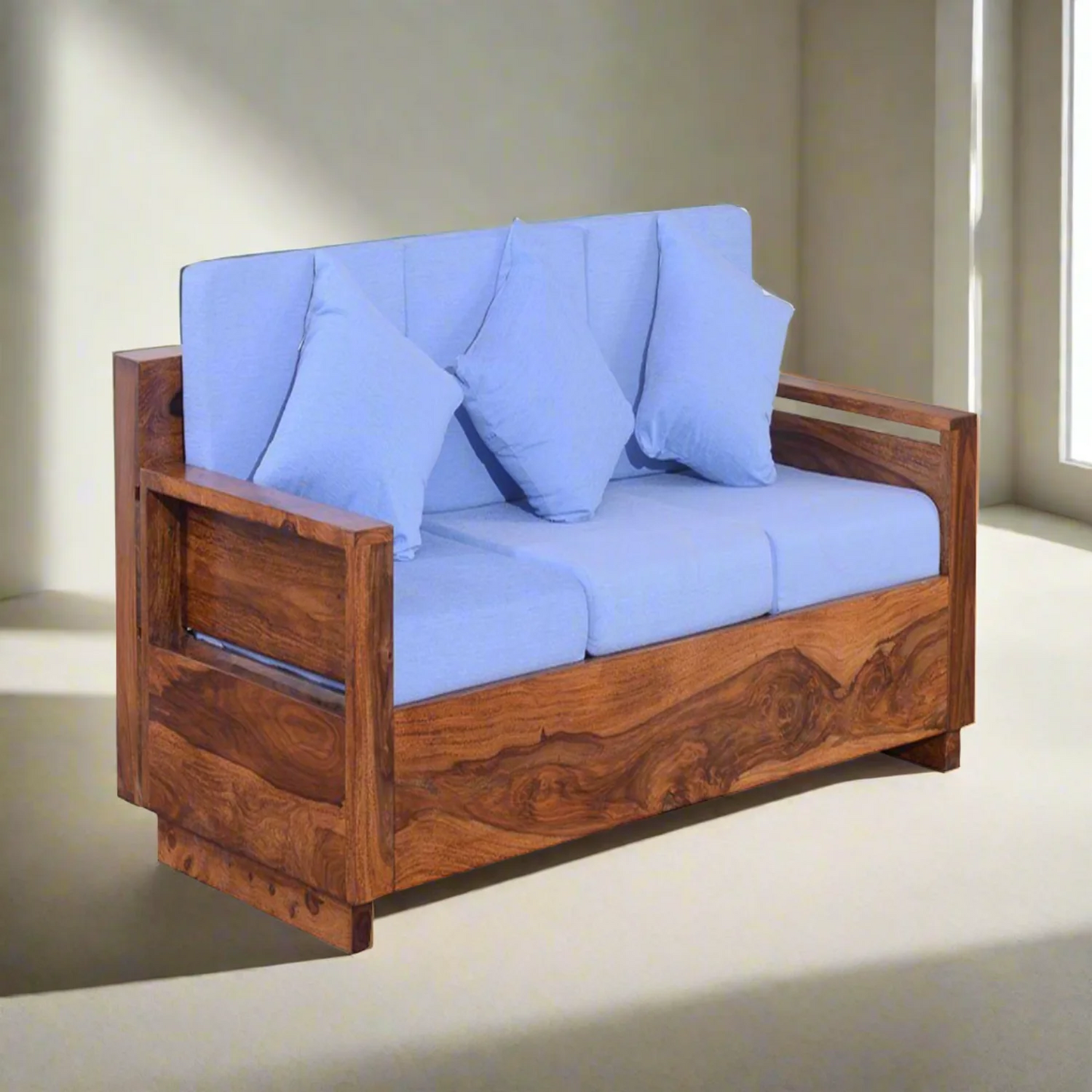 Honey wood single seater sofa chair with blue cushions and plush back pillows
