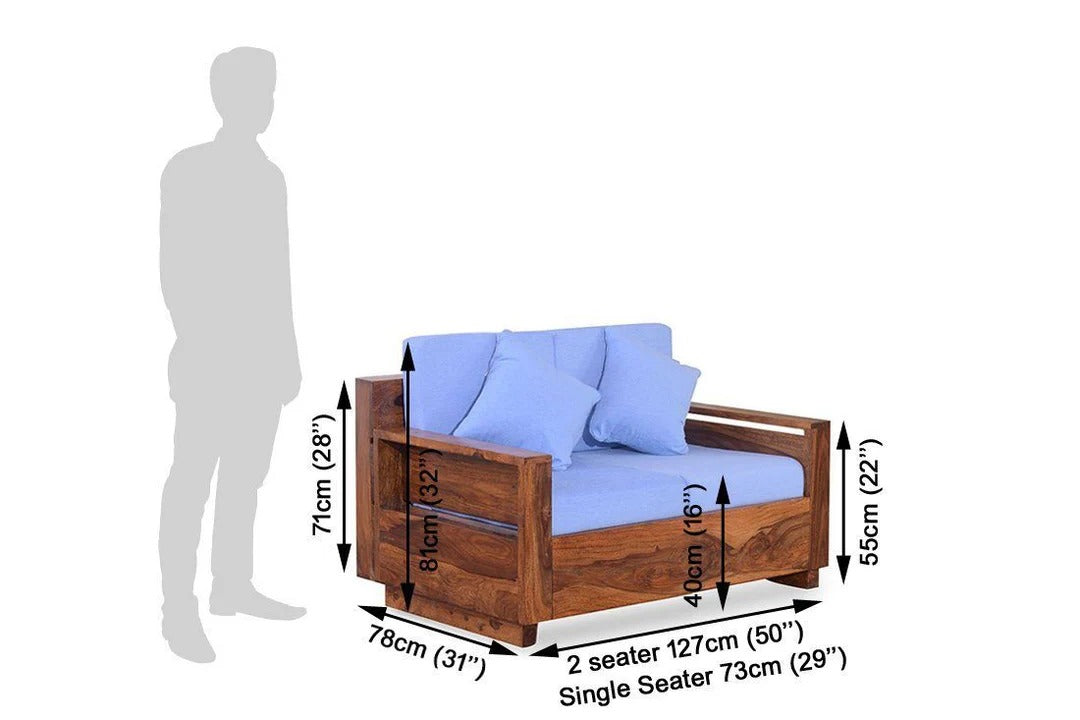 Single seater honey wood sofa chair with blue seat cushions and back pillows