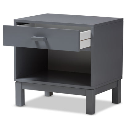 Grey nightstand with drawer and open shelf, angled view with top and metal pull.