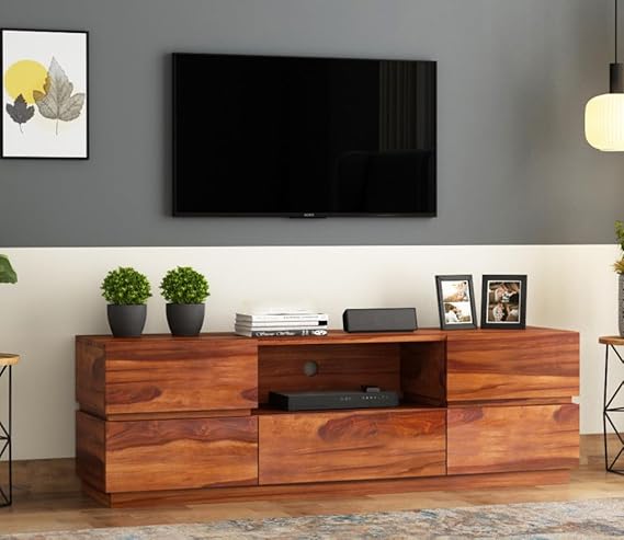 Sheesham TV console with honey finish, drawers, and open media shelf under a TV