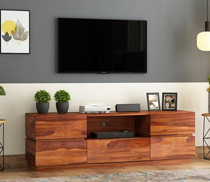 Sheesham TV console with honey finish, drawers, and open media shelf under a TV